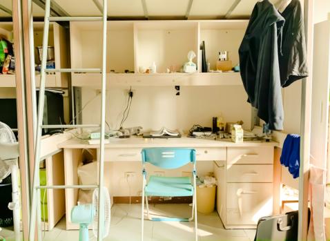 Photographie d'une chambre étudiante